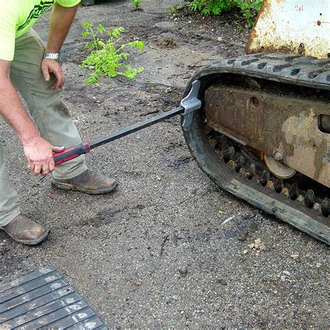 replacing track on skid steer|skid steer track removal tool.